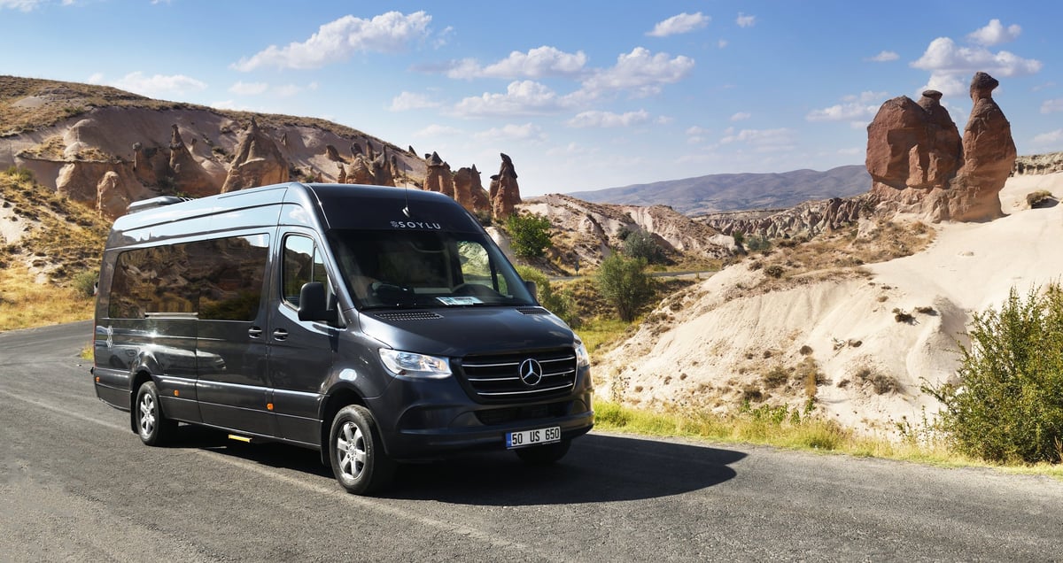 Luxury black Mercedes-Benz Sprinter passenger van