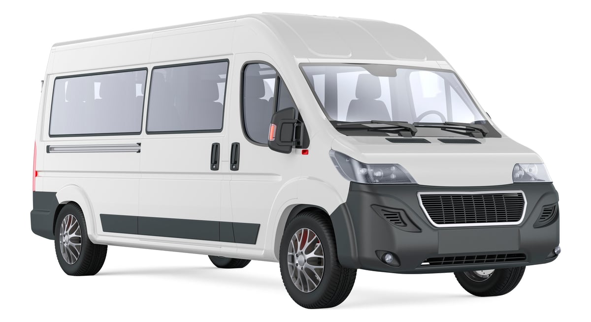 White passenger van for group shuttle transportation