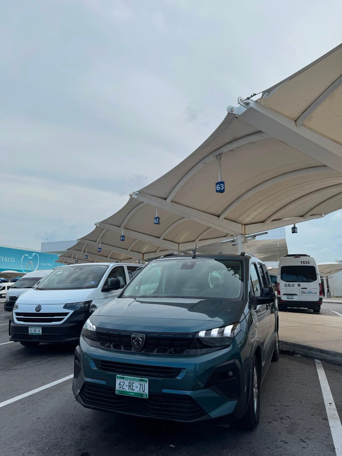 TTC Peugeot Rifter at Cancun International Airport for a private transfer to Akumal