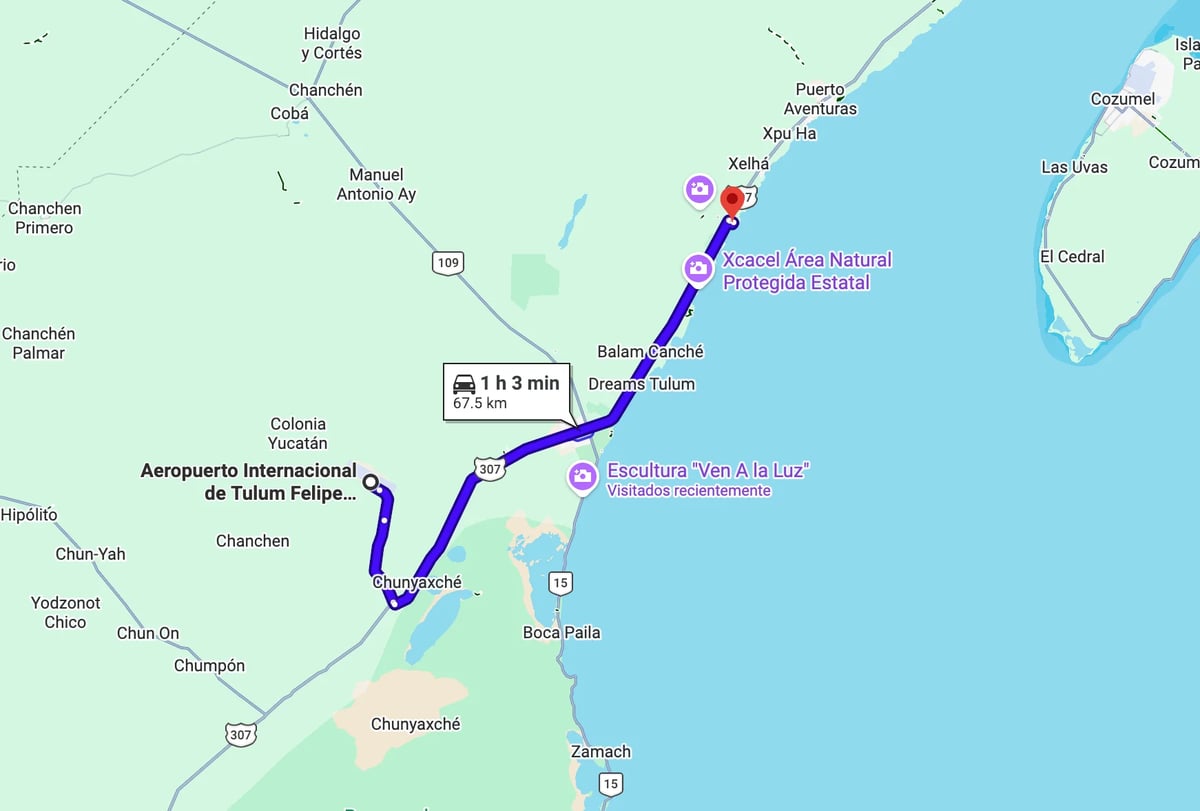 Map showing a blue route line with distance markers connecting Tulum Airport to Cancun area, Mexico, spanning 1.5 miles
