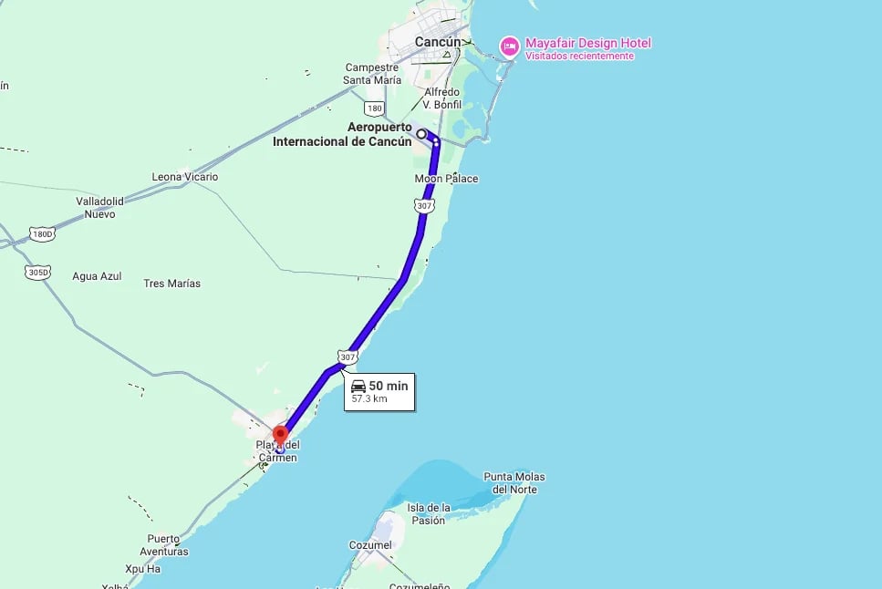 Map showing a 55-minute driving route between an airport and coastal city destination along a blue highlighted path