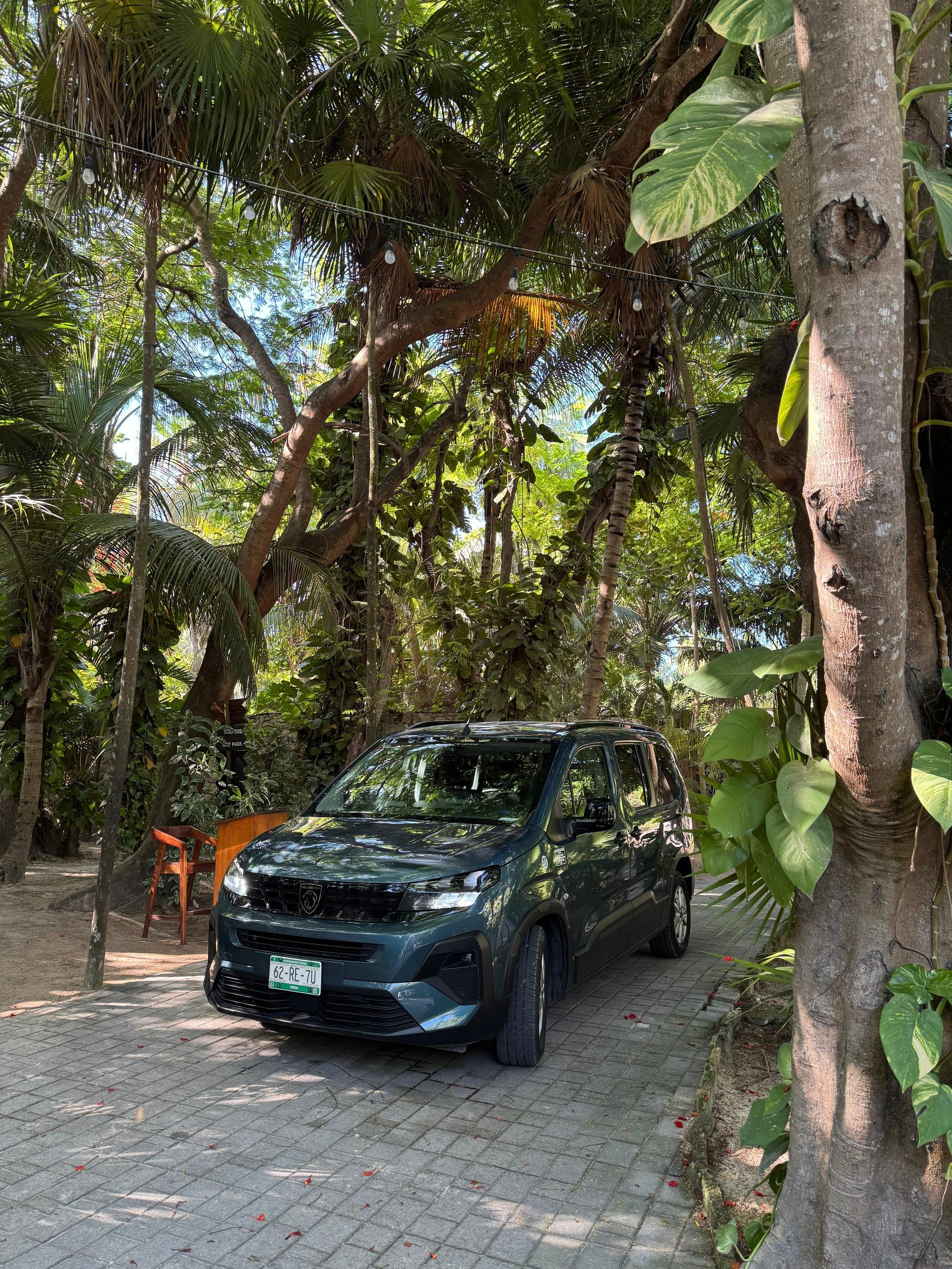 TTC Peugeot Rifter at a tropical Riviera Maya hotel entrance